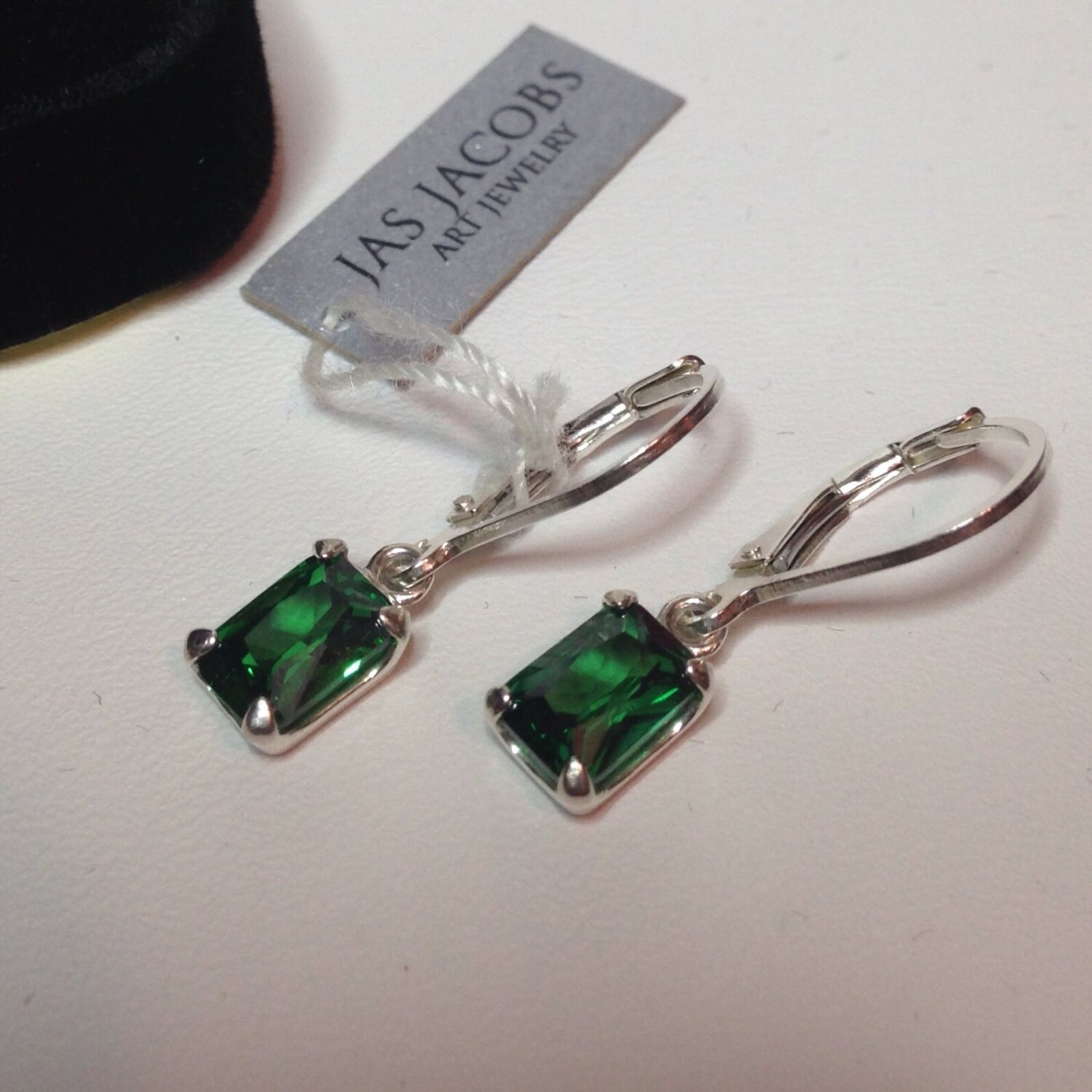 Beautiful 1.7ctw Emerald Cut Emerald Earrings In Sterling Silver